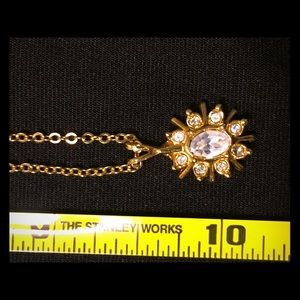 Novelty necklace with starburst design pendant